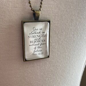 NWT Faith Based  Pendant Necklace- She‎ is Clothed in Strength - Proverbs 31:25